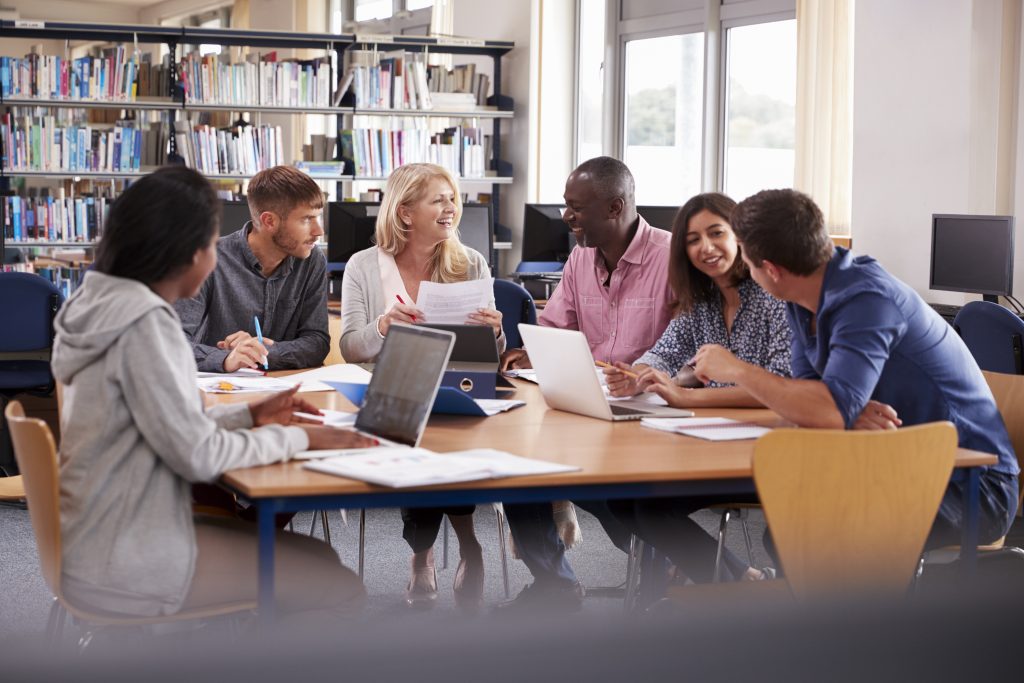 Group of adults collaborating on a project