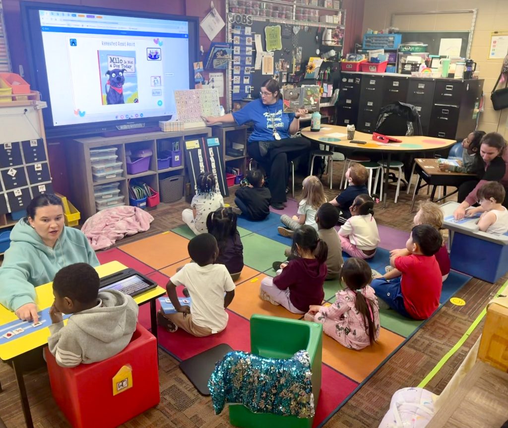 Waterloo CSD Kittrell Elementary preschool class using Augmentative and Alternative Communication (AAC) tools together with their teacher.