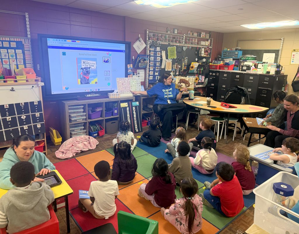 Waterloo CSD Kittrell Elementary preschool class using Augmentative and Alternative Communication (AAC) tools together with their teacher.