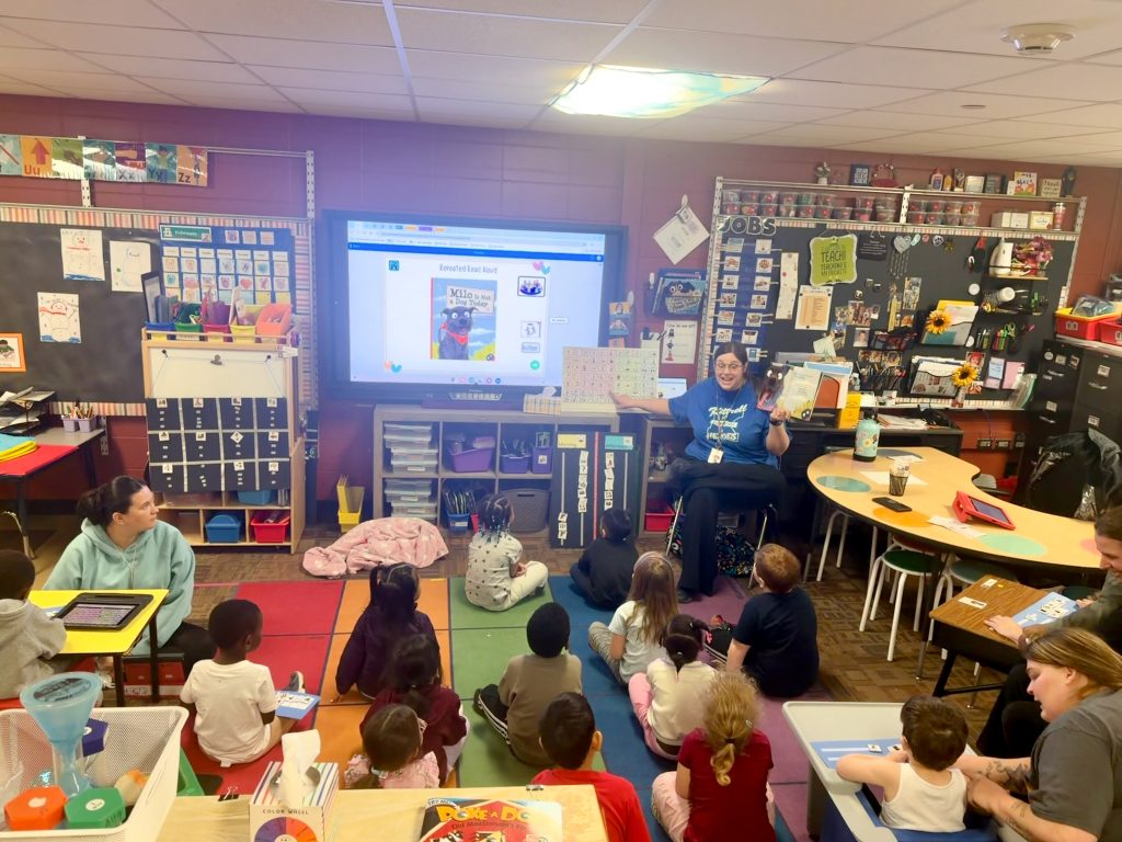 Waterloo CSD Kittrell Elementary preschool class using Augmentative and Alternative Communication (AAC) tools together with their teacher.