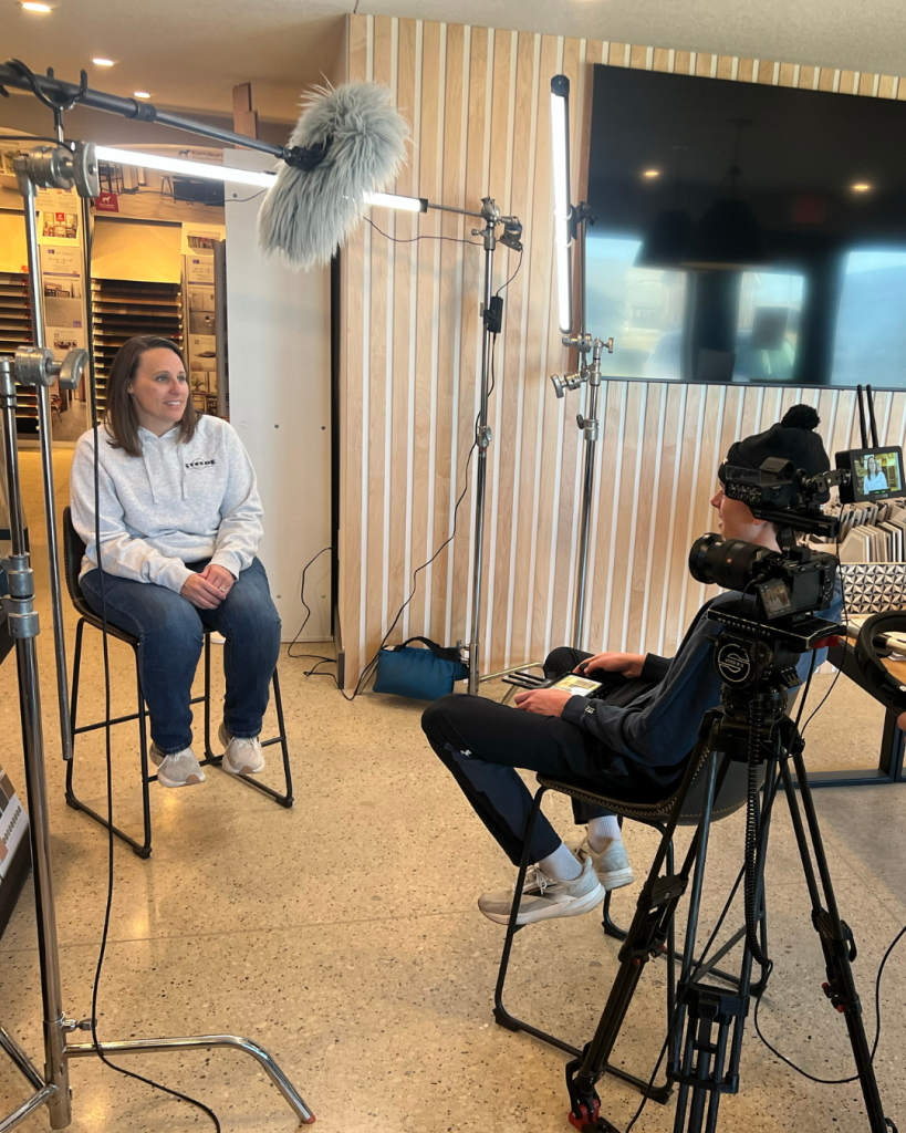 Grady interviewing Serena from Steege Construction for his video project.